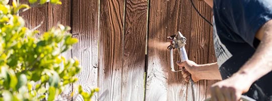 How to Tell When You Should Paint vs. Stain a Fence post