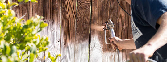 How to Tell When You Should Paint vs. Stain a Fence